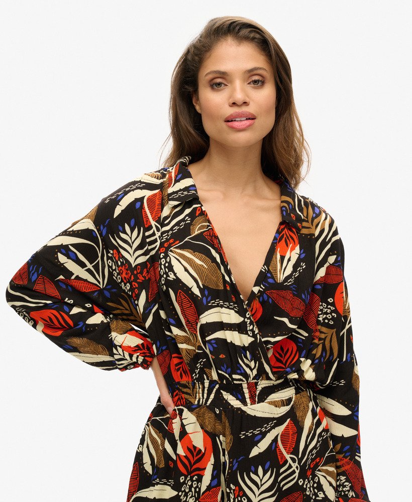 vintage strandjumpsuit met i see you-print.