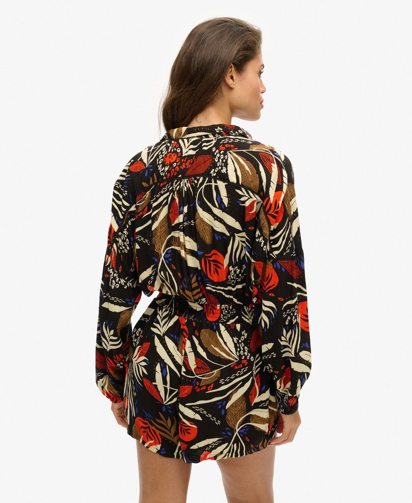 vintage strandjumpsuit met i see you-print.