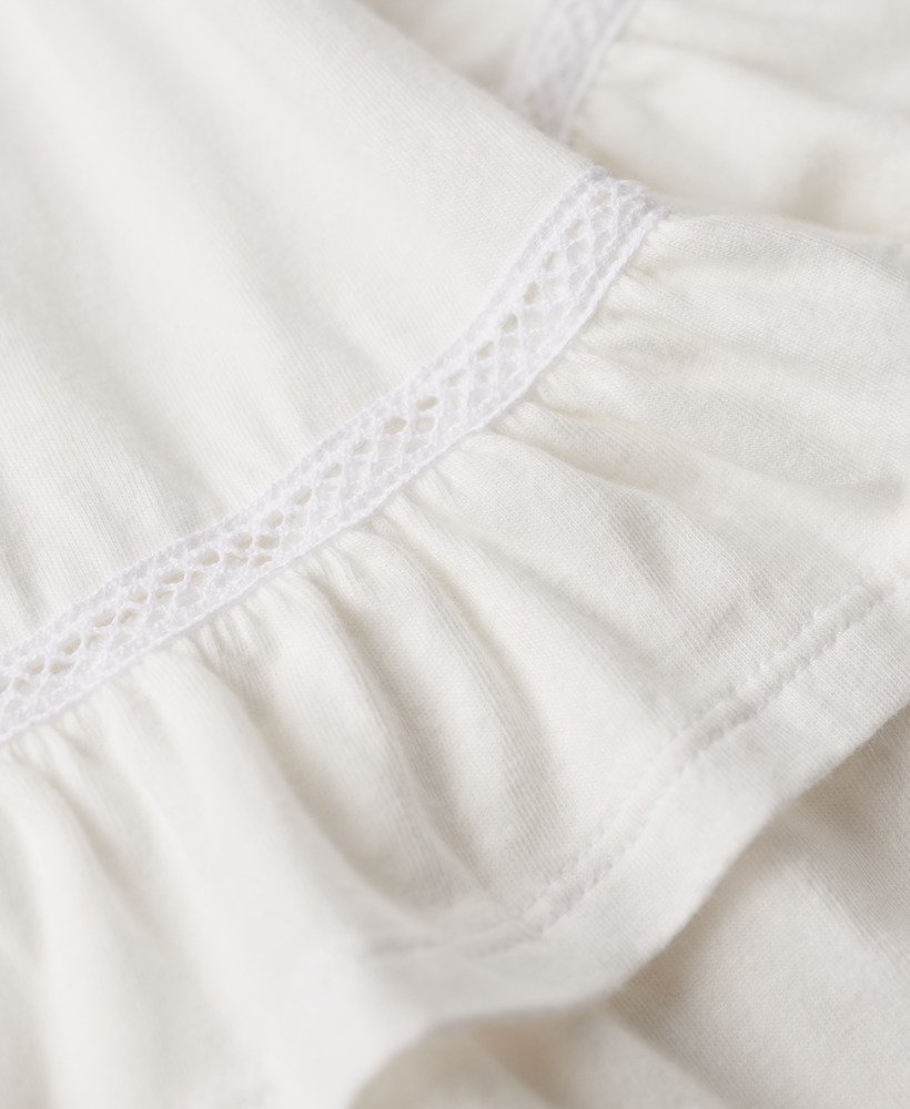 mini-jurk met kanten bandeau uit de jaren 50 in optic