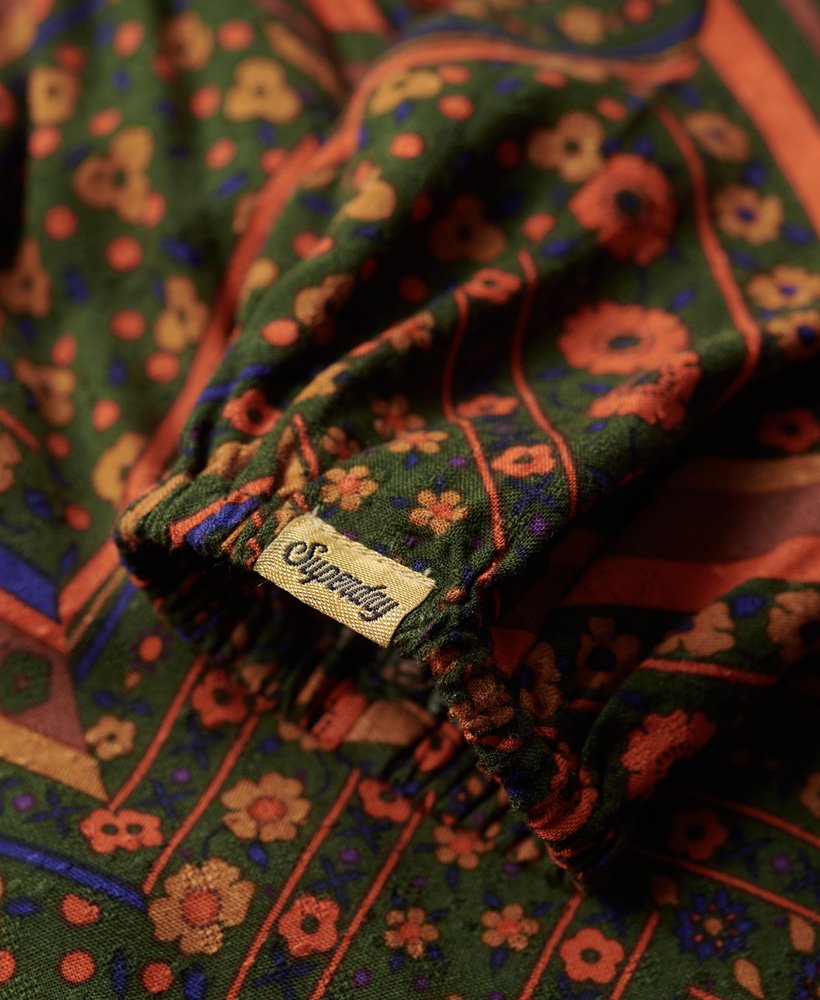 bedrukte maxi-jurk met smockwerk en chevronbloemenprint