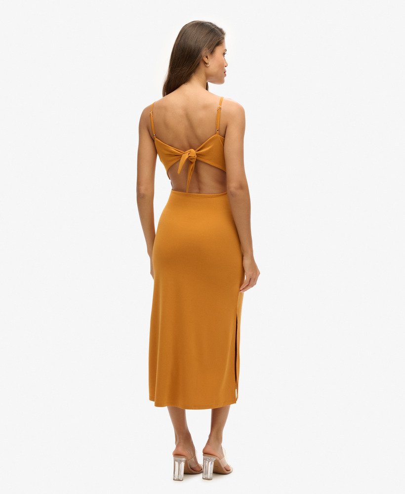 jersey jurk met open rug in erfgoed oker.