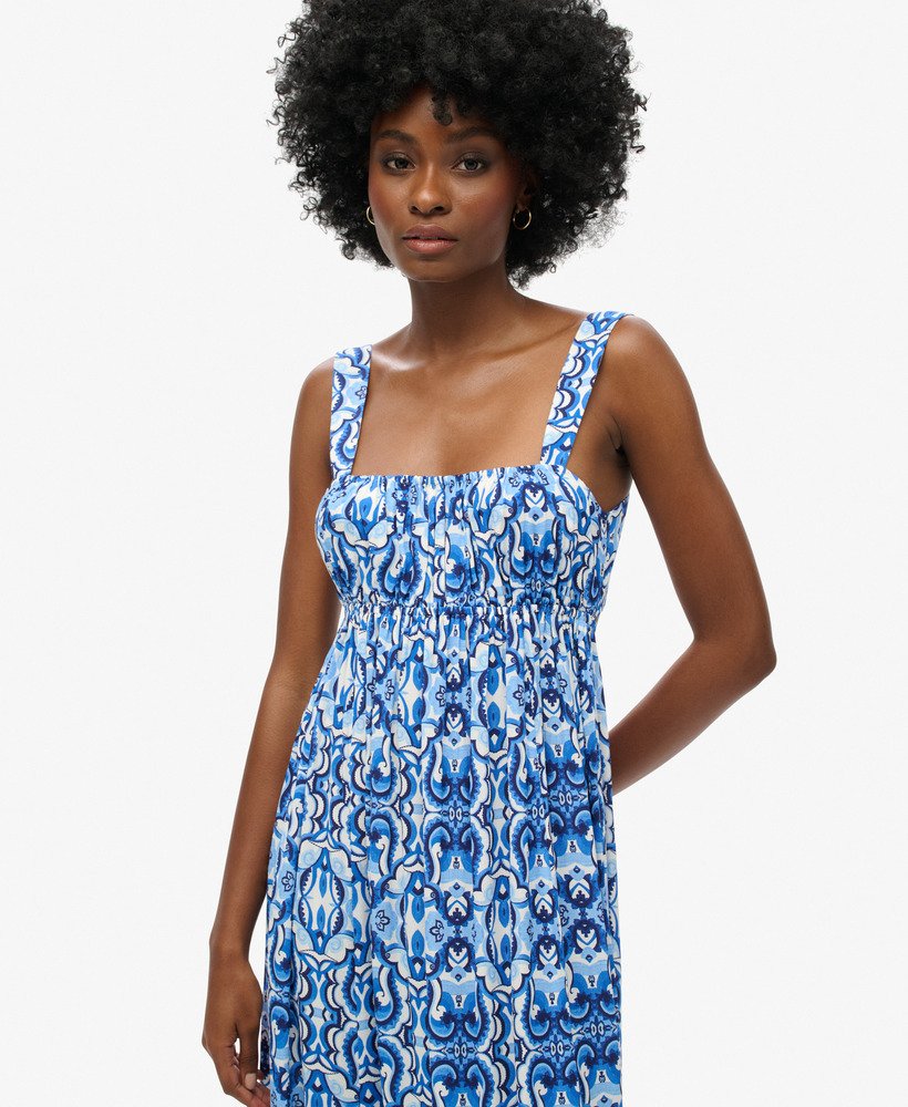 maxi-jurk met strik op de rug in tegelprint blauw