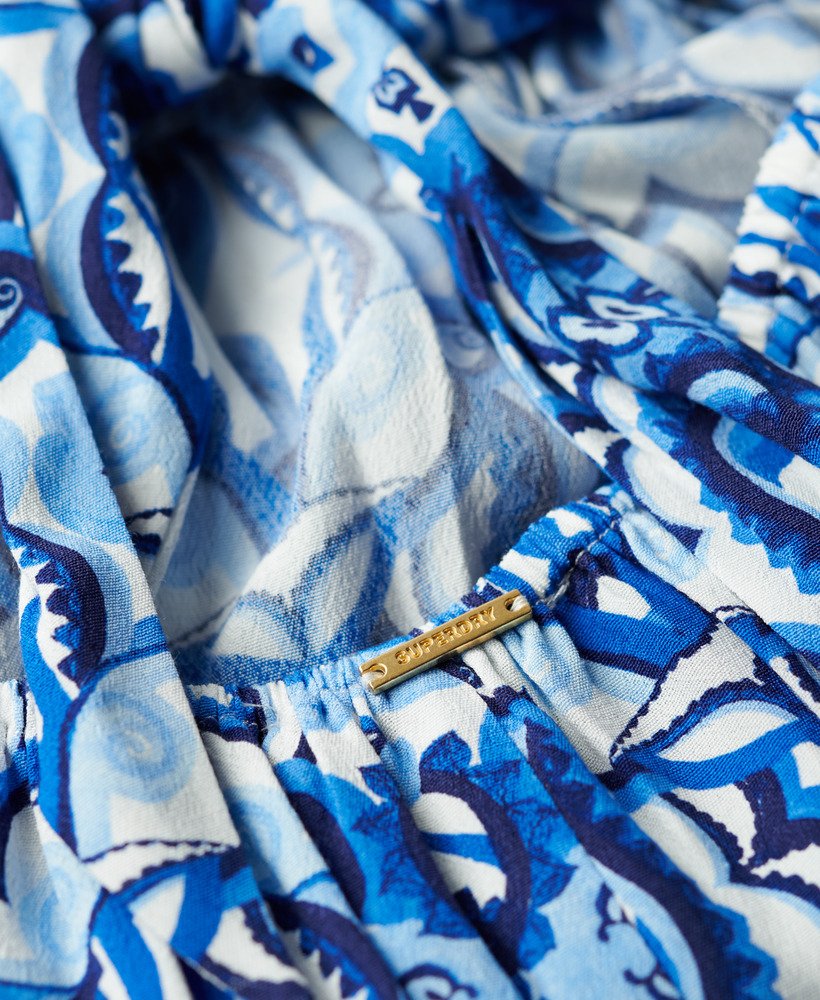 maxi-jurk met strik op de rug in tegelprint blauw