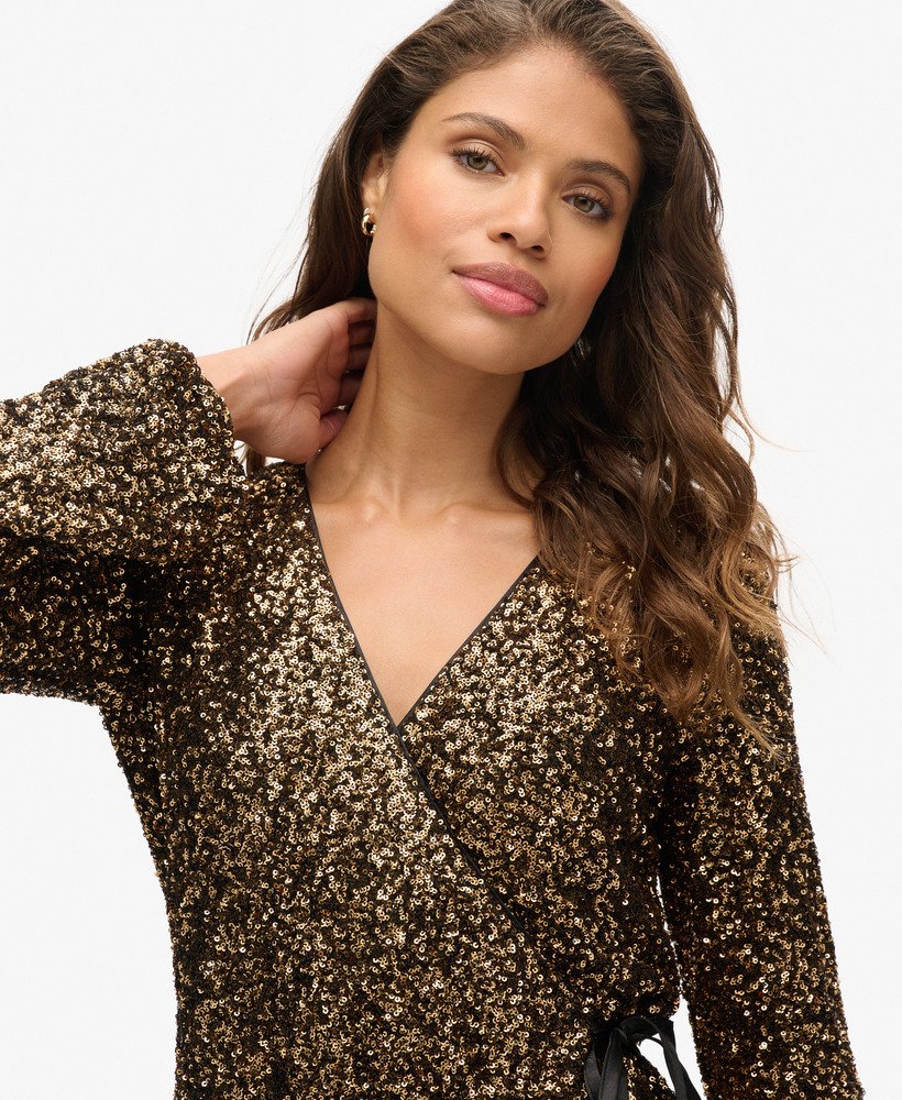 mini-jurk met pailletten en wikkeldetail in goudkleurige mega-pailletten