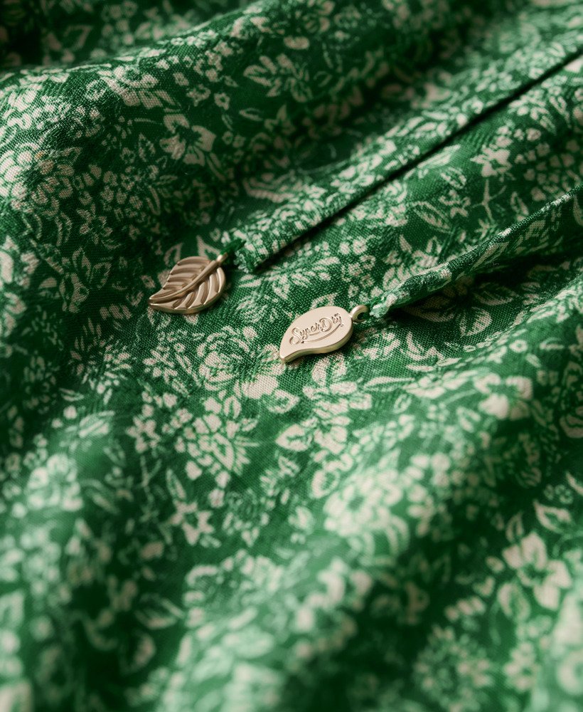 bedrukte mini-jurk met lange mouwen en overslagprint in een weelderig groen.