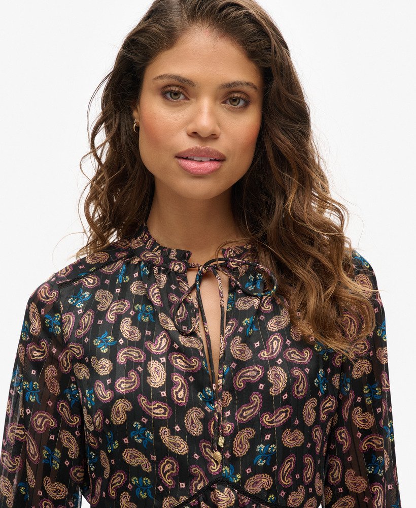 bedrukte metallic mini-jurk met lange mouwen en paisleyprint zwarte sjaal