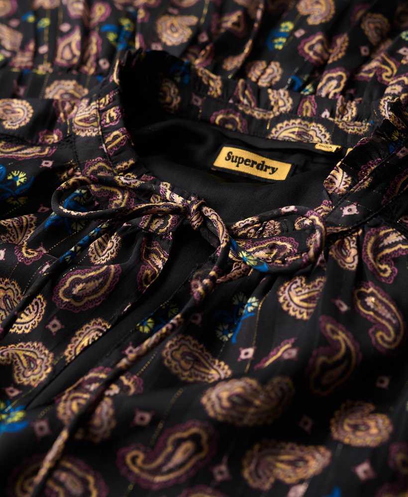 bedrukte metallic mini-jurk met lange mouwen en paisleyprint zwarte sjaal