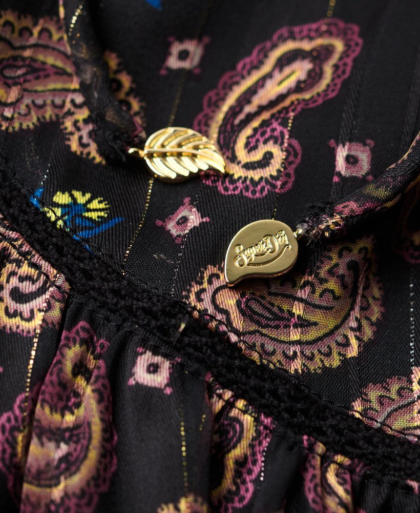 bedrukte metallic mini-jurk met lange mouwen en paisleyprint zwarte sjaal