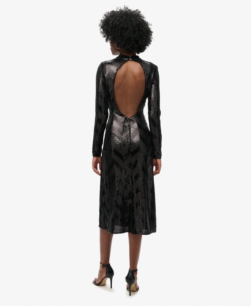 midi-jurk met chevronpatroon en open rug in zwart met art deco pailletten.