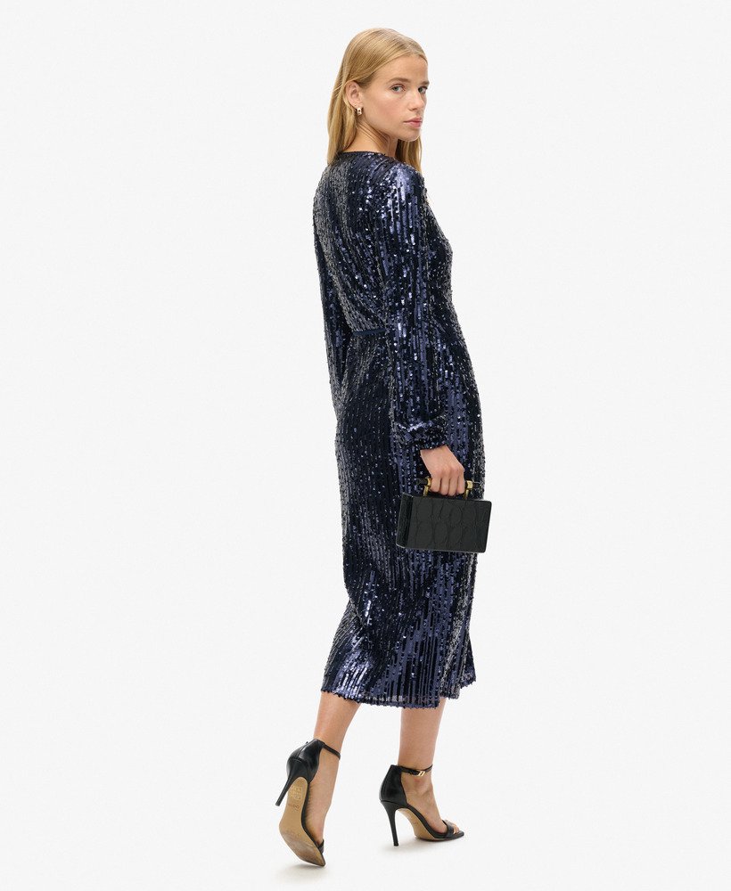 maxi-jurk met pailletten en wikkeldetail in marineblauw.