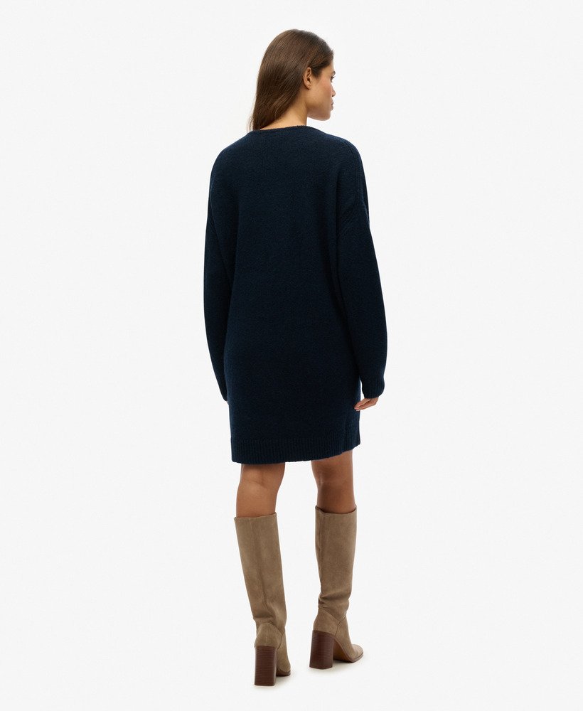 oversized v-hals jurk in donkerblauwgroen met een twist