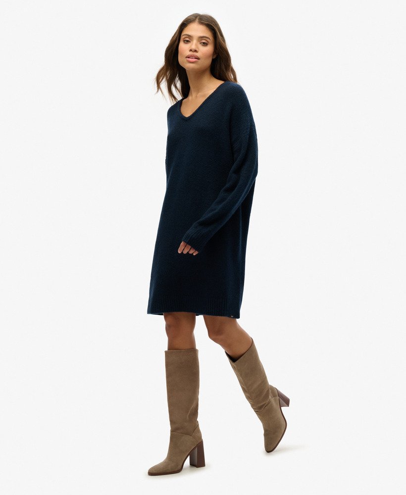 oversized v-hals jurk in donkerblauwgroen met een twist