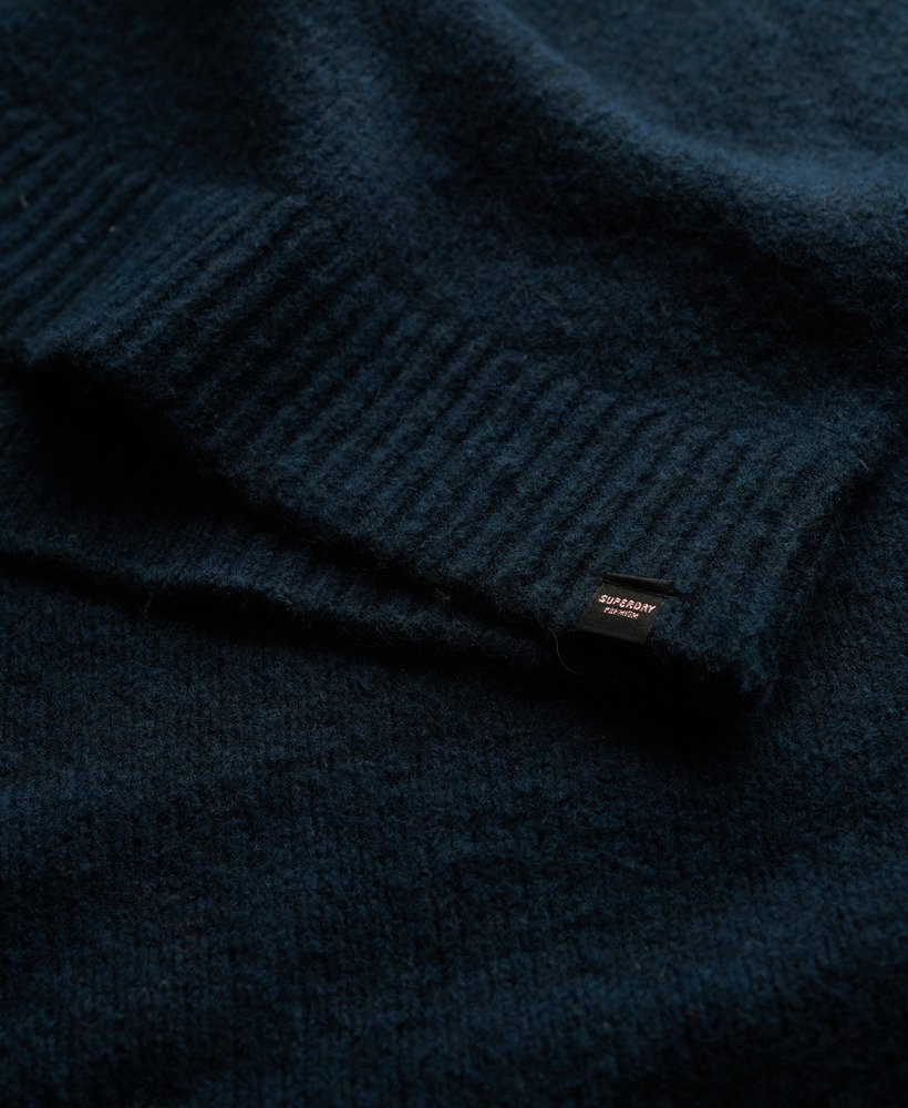 oversized v-hals jurk in donkerblauwgroen met een twist