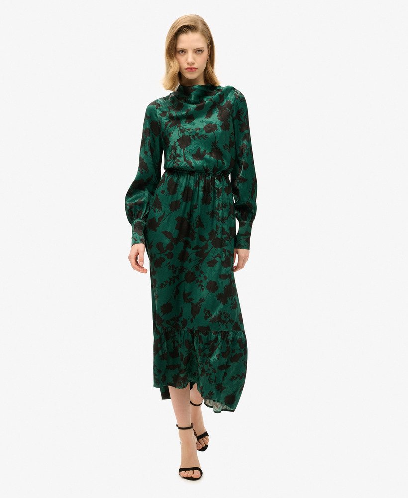maxi jacquardjurk met colkraag in een turquoise bloemenprint.