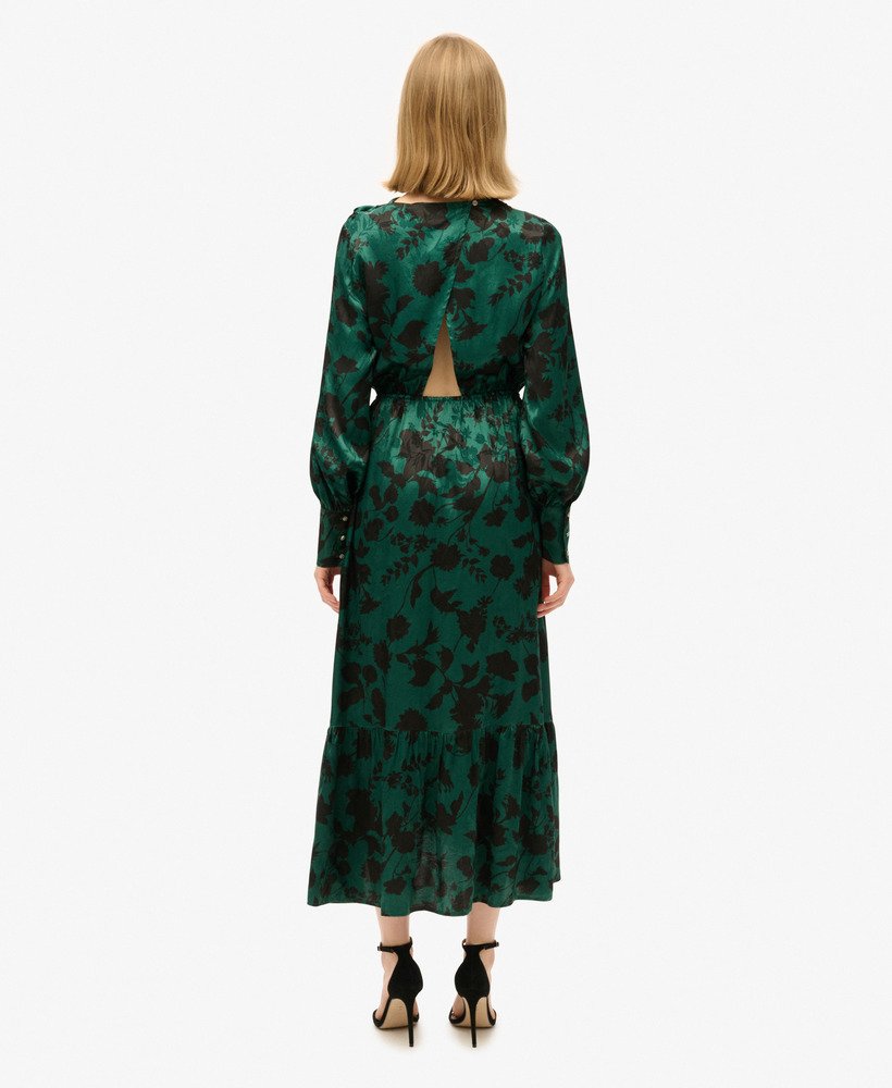 maxi jacquardjurk met colkraag in een turquoise bloemenprint.