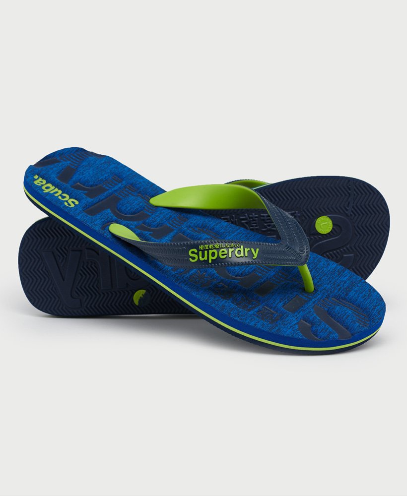 essential logo flip flops in cobalt grid
