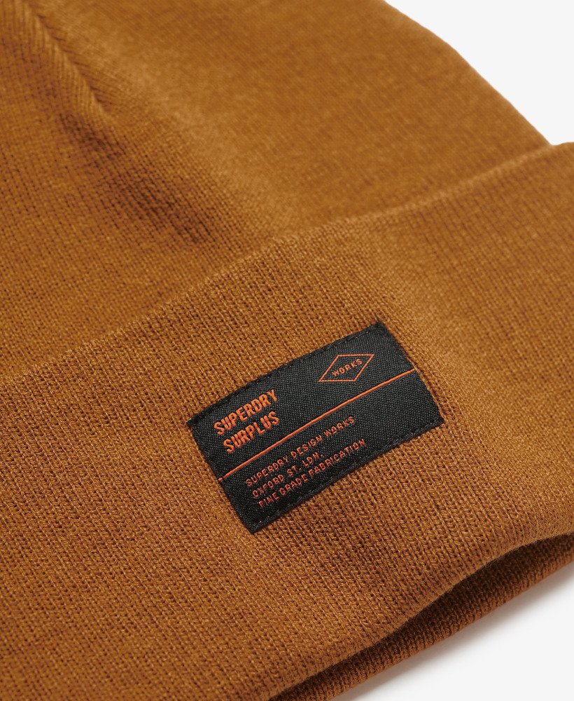gebreide muts uit de overschotcollectie in tabaksbruin van denim co.