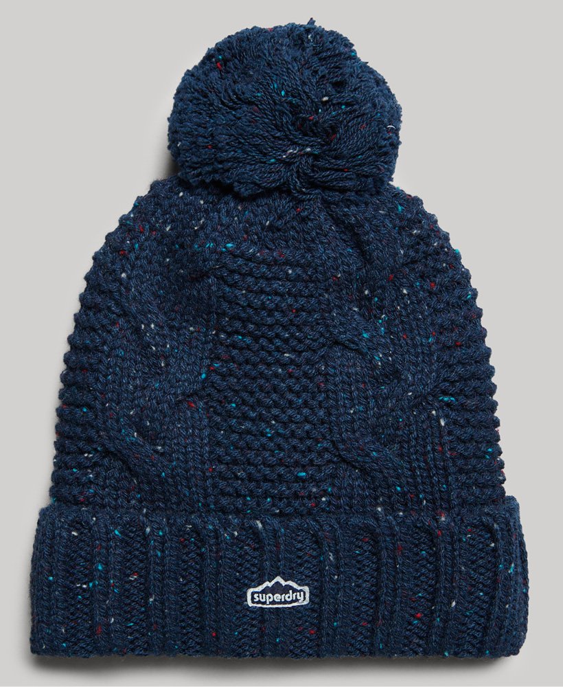 kabelgebreide muts met pompon in donkerblauw tweed