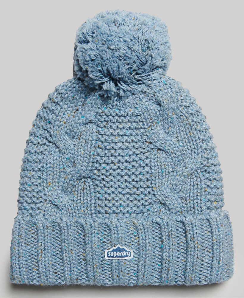 kabelgebreide muts met pompon in zachtblauwe tweed