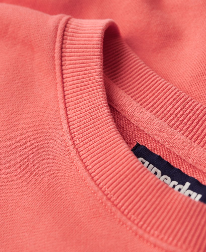 vintage gewassen sweatshirt in fel koraalrood.