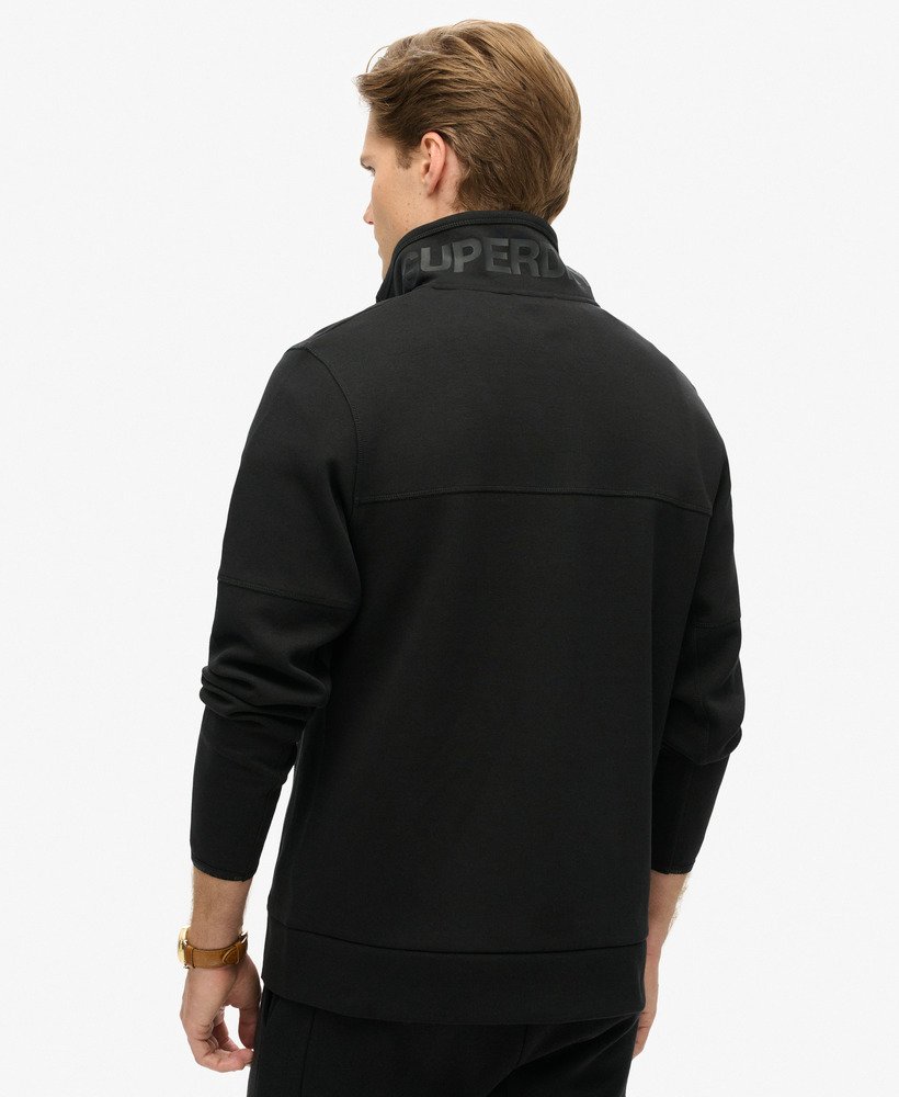 tech logo loose half zip in zwart