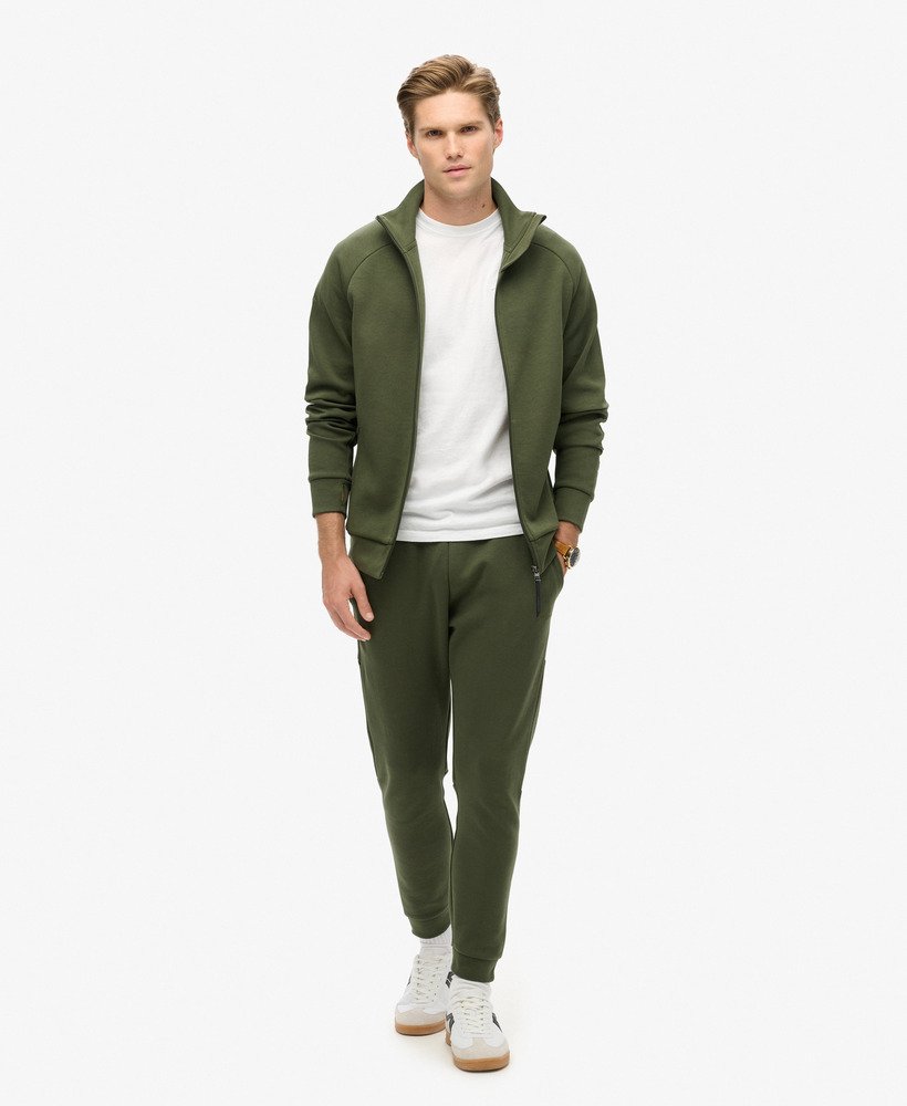 tech loose track top in donker mosgroen