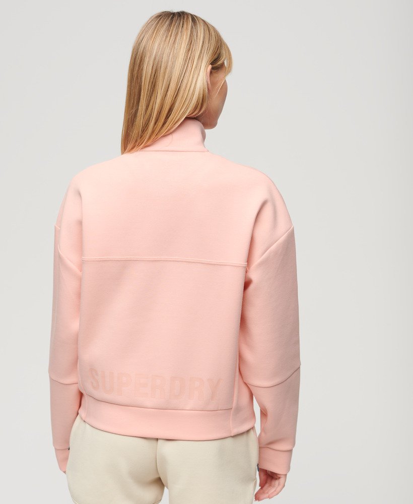 sport tech relaxed half zip in peach pearl pink