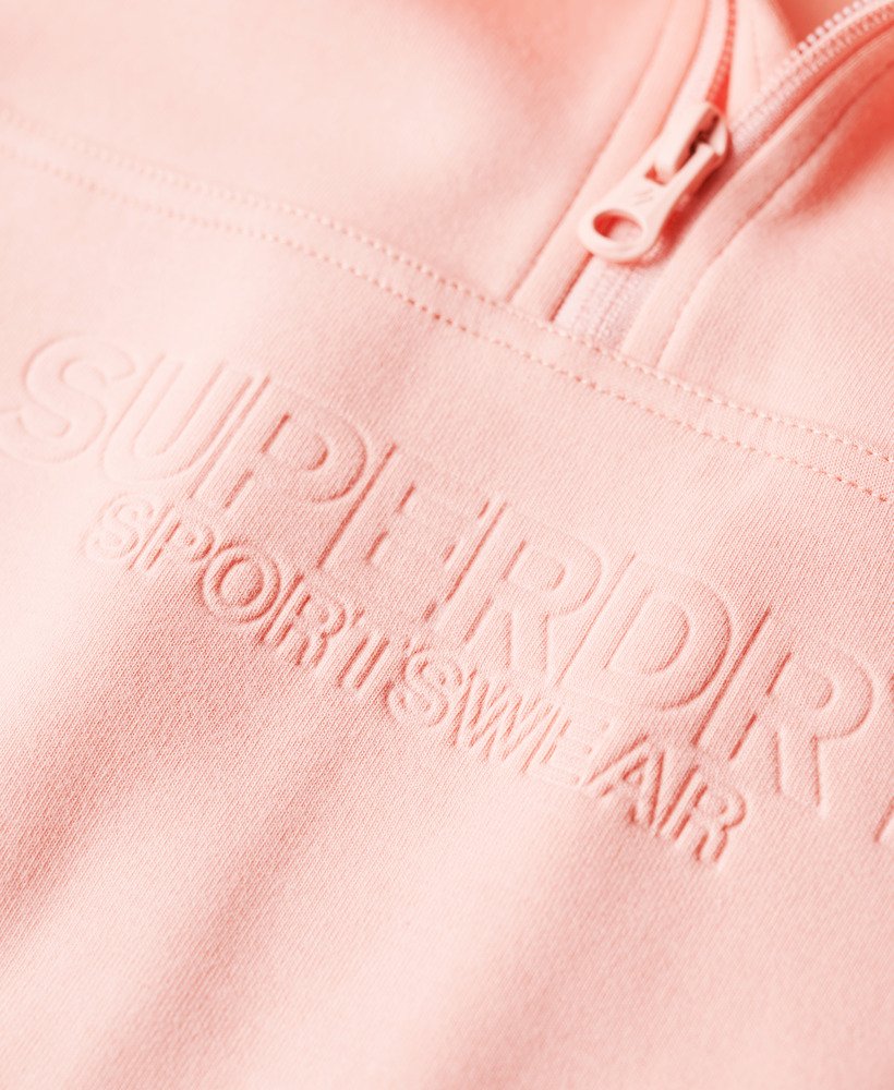 sport tech relaxed half zip in peach pearl pink