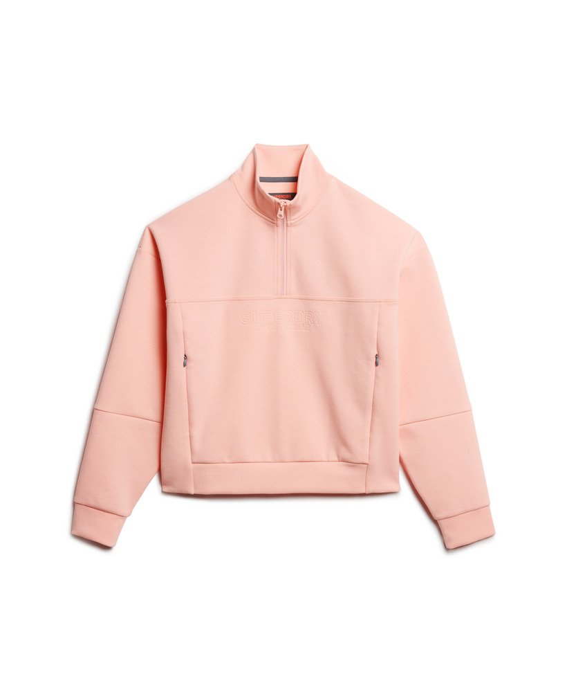 sport tech relaxed half zip in peach pearl pink