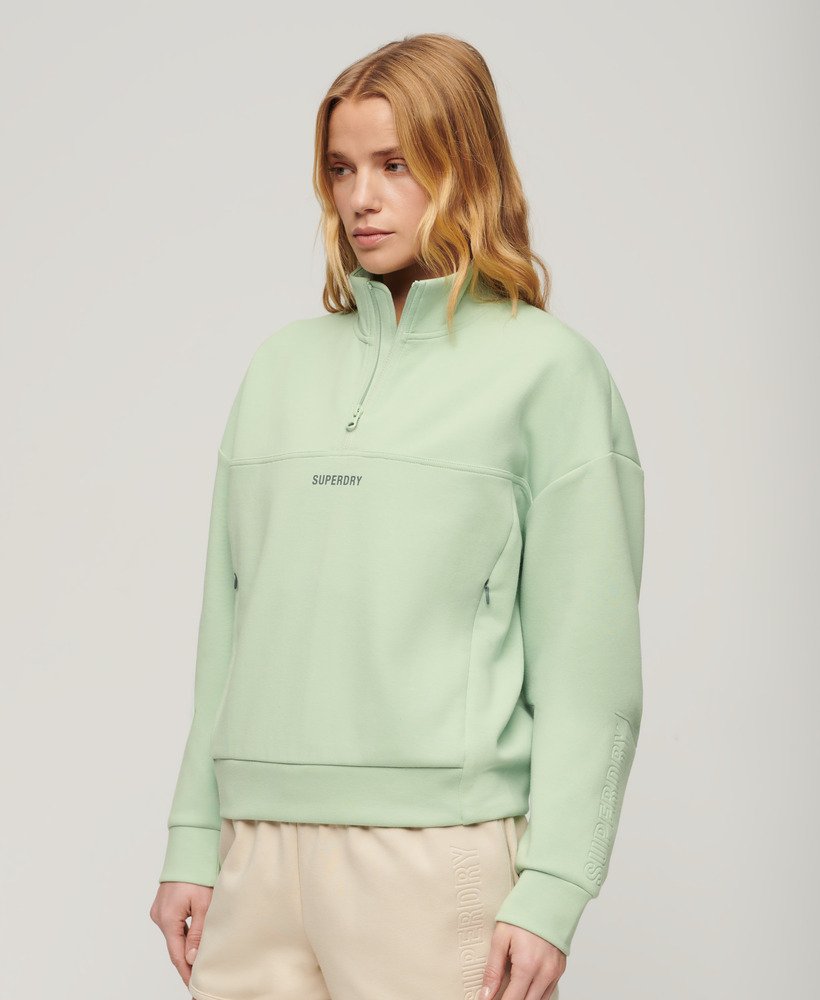 sport tech relaxed half zip in zeegroen