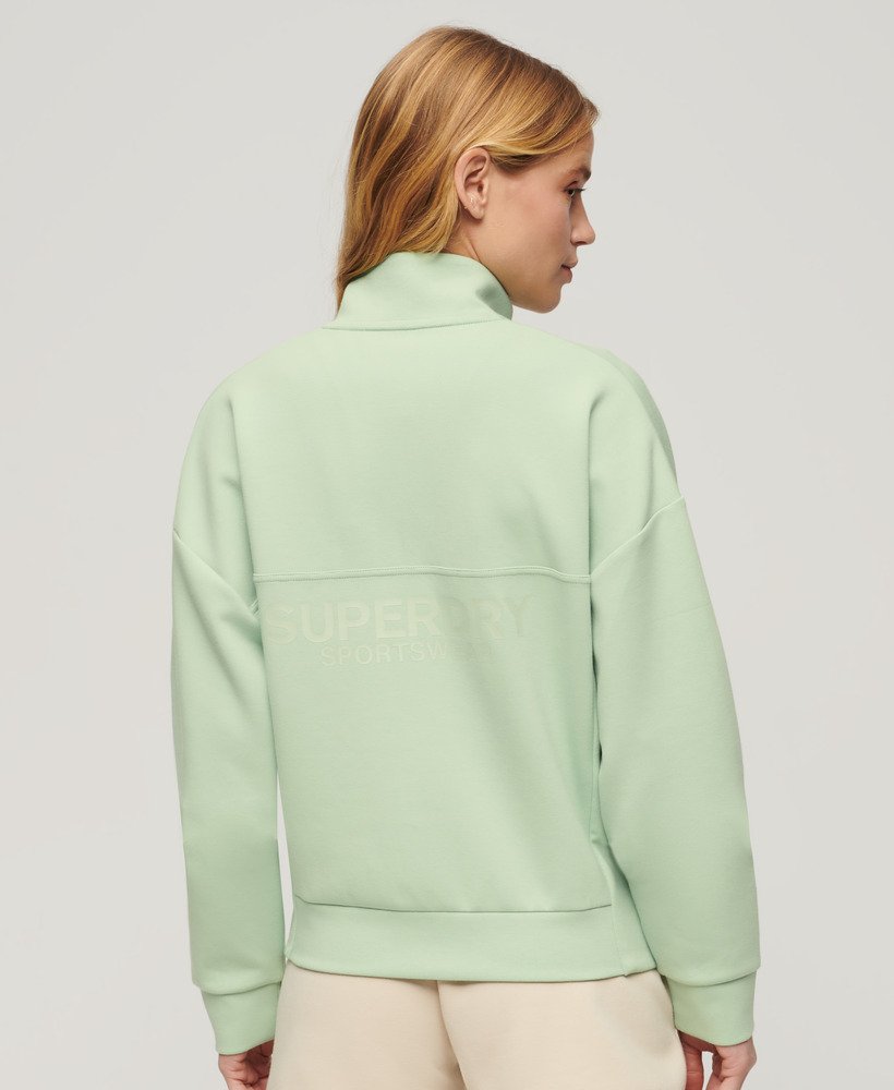 sport tech relaxed half zip in zeegroen