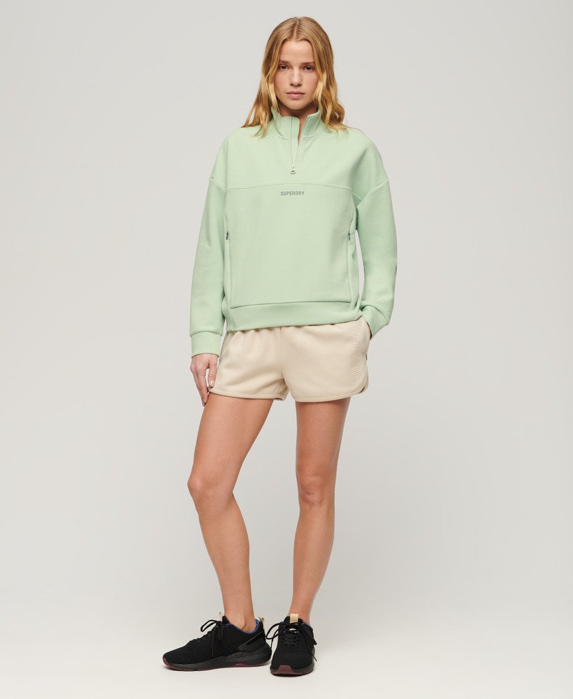 sport tech relaxed half zip in zeegroen