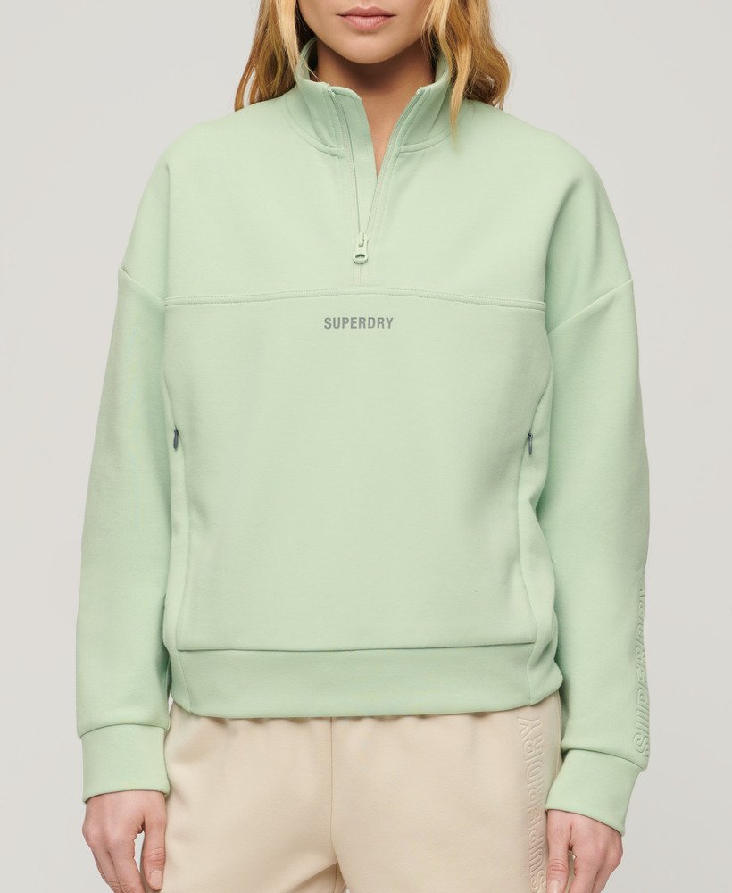 sport tech relaxed half zip in zeegroen