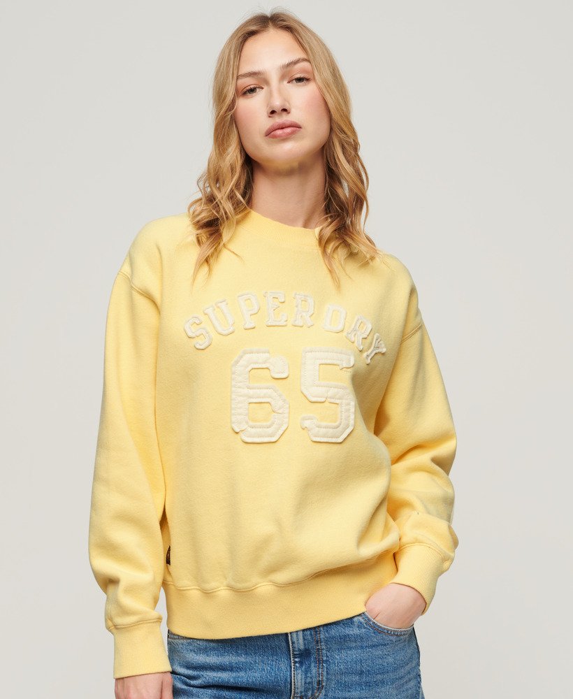 sportieve losse sweater met applicaties in lichtgeel