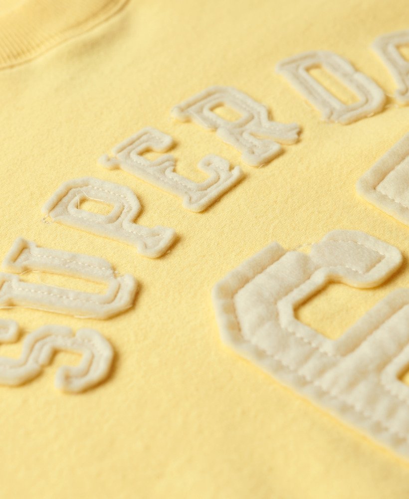 sportieve losse sweater met applicaties in lichtgeel
