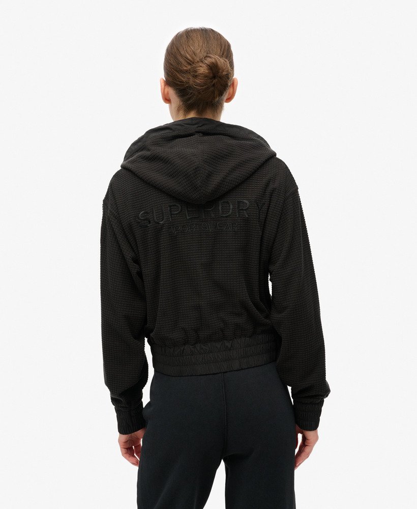 sport tech grid fleece ziphood in zwart