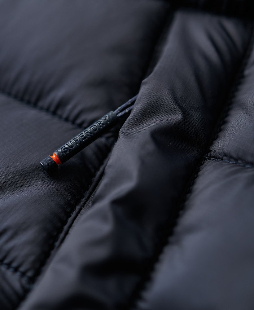 gewatteerde fuji-jas met capuchon in eclipse navy