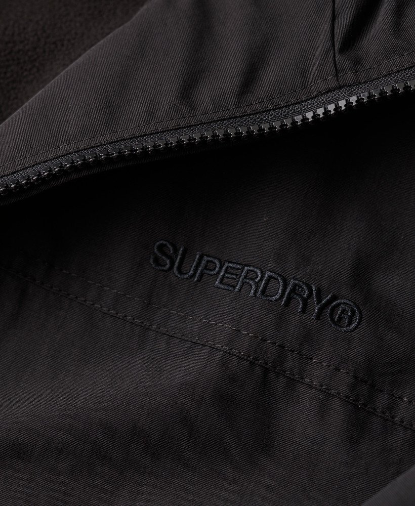 overgebleven nylon bomberjack met capuchon in gitzwart.