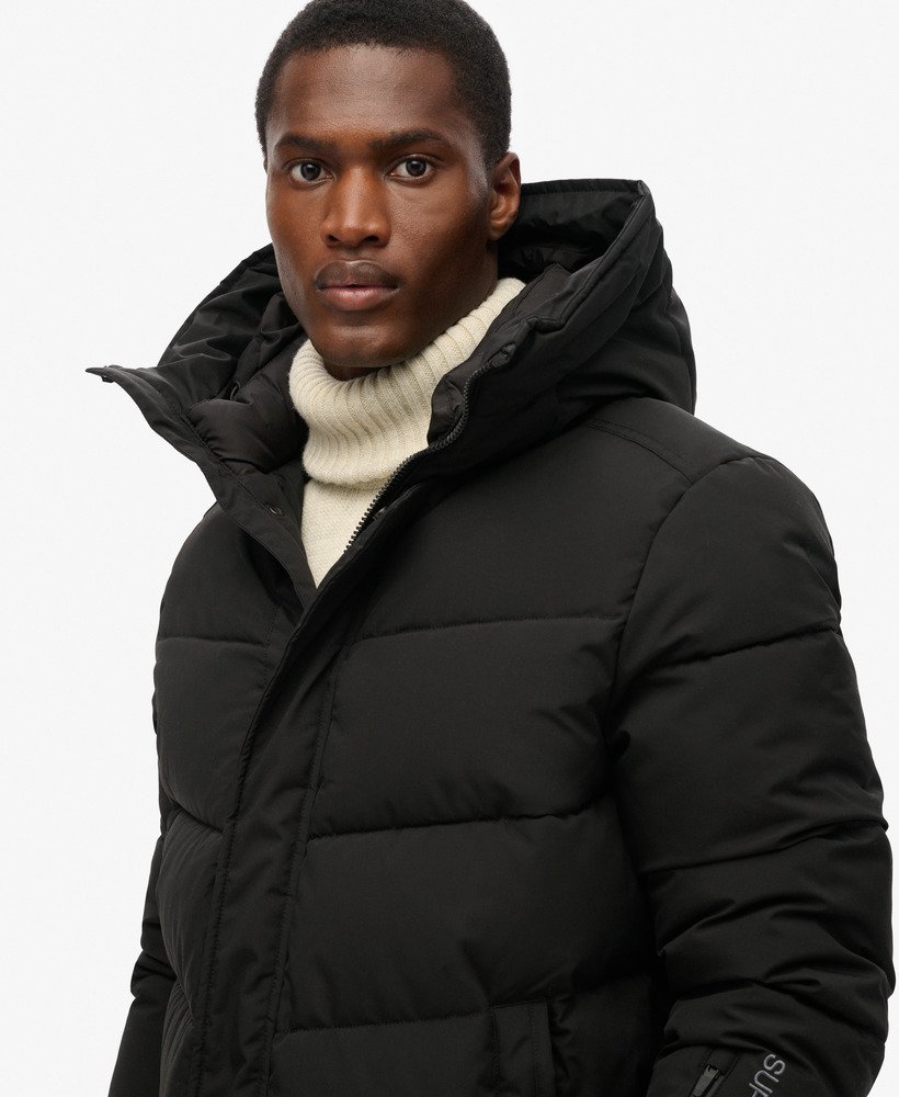 gewatteerde parka met city chevron-patroon in zwart