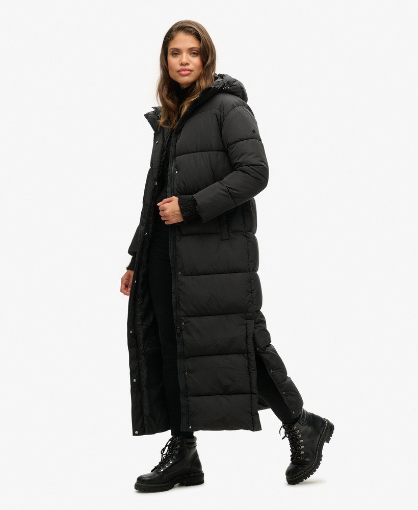 maxi-pufferjas met capuchon in zwart