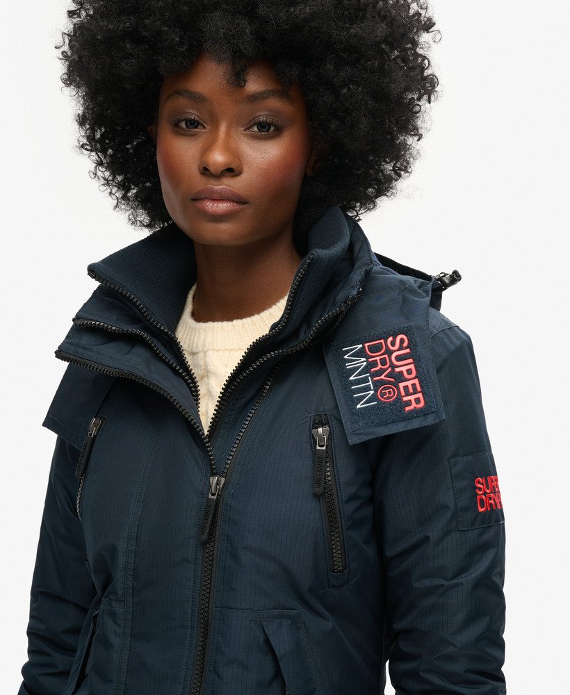hooded mountain windbreaker jacket in eclipse navy
