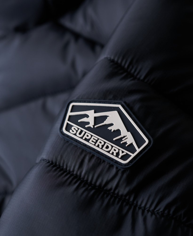 gewatteerde fuji-jas met capuchon in eclipse navy
