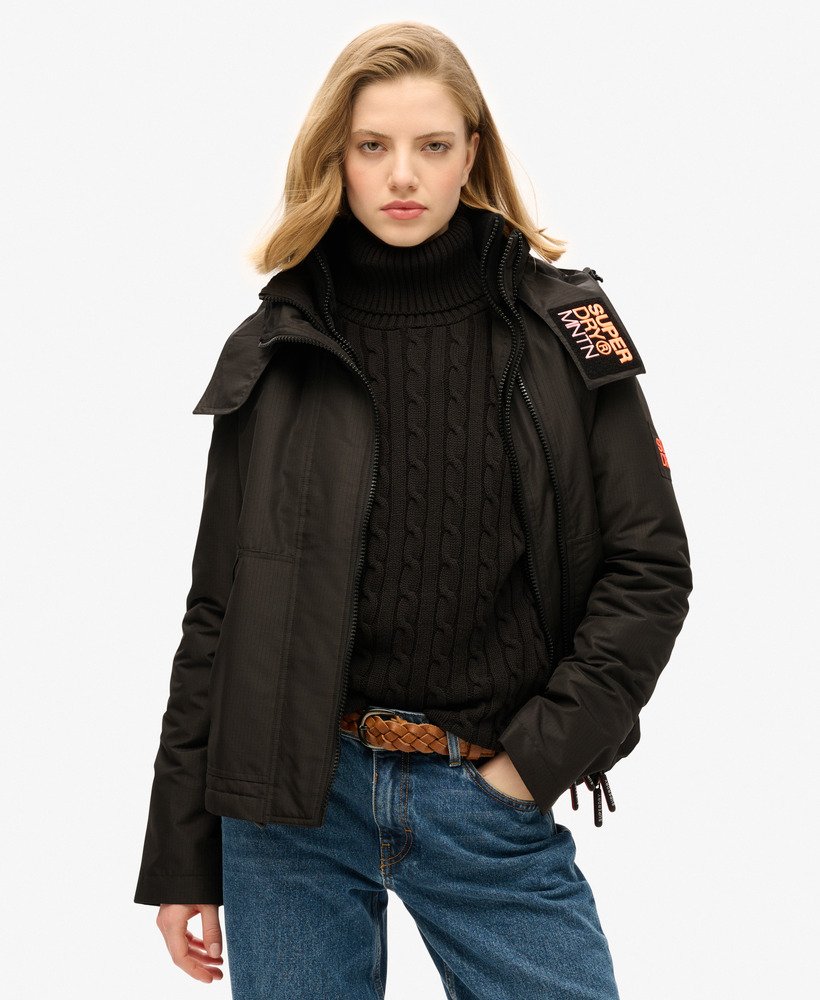 windbreaker met capuchon in zwartpastellijn koraal