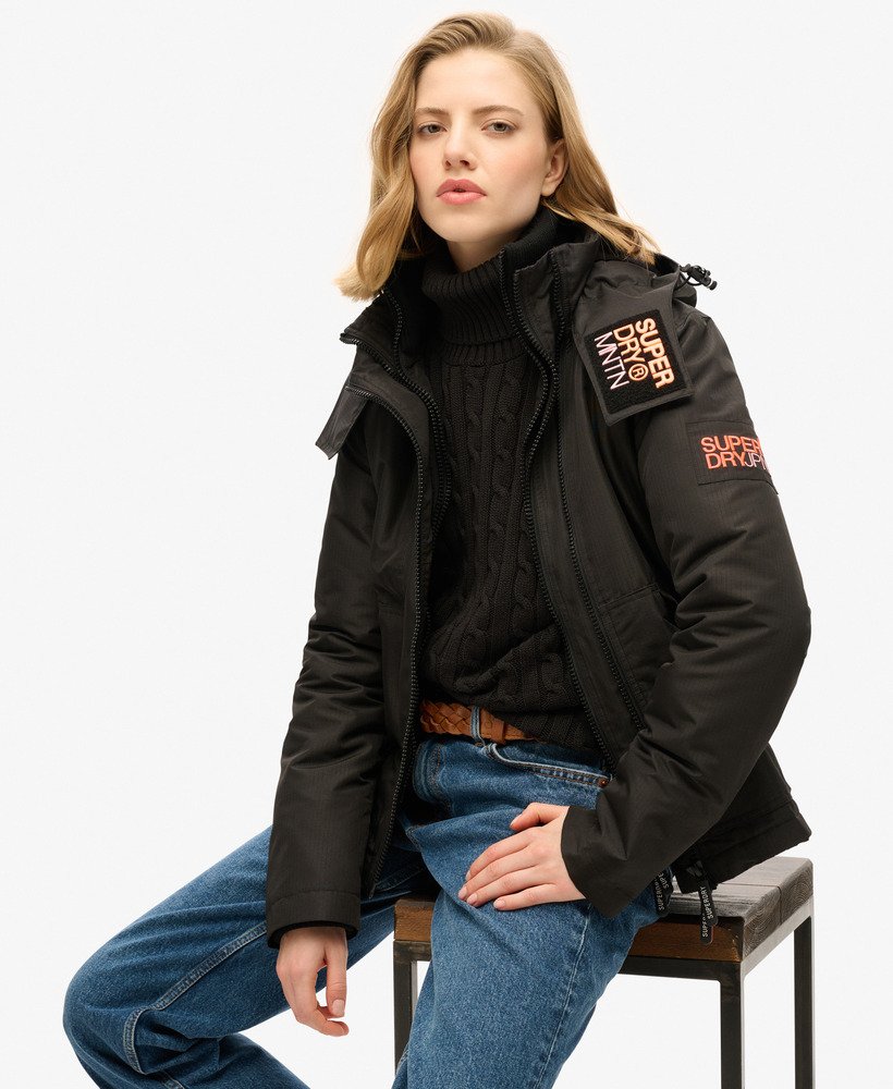 windbreaker met capuchon in zwartpastellijn koraal