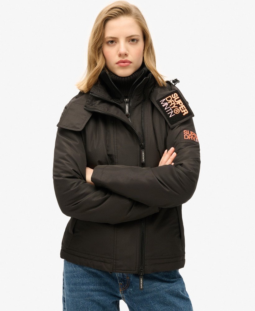 windbreaker met capuchon in zwartpastellijn koraal
