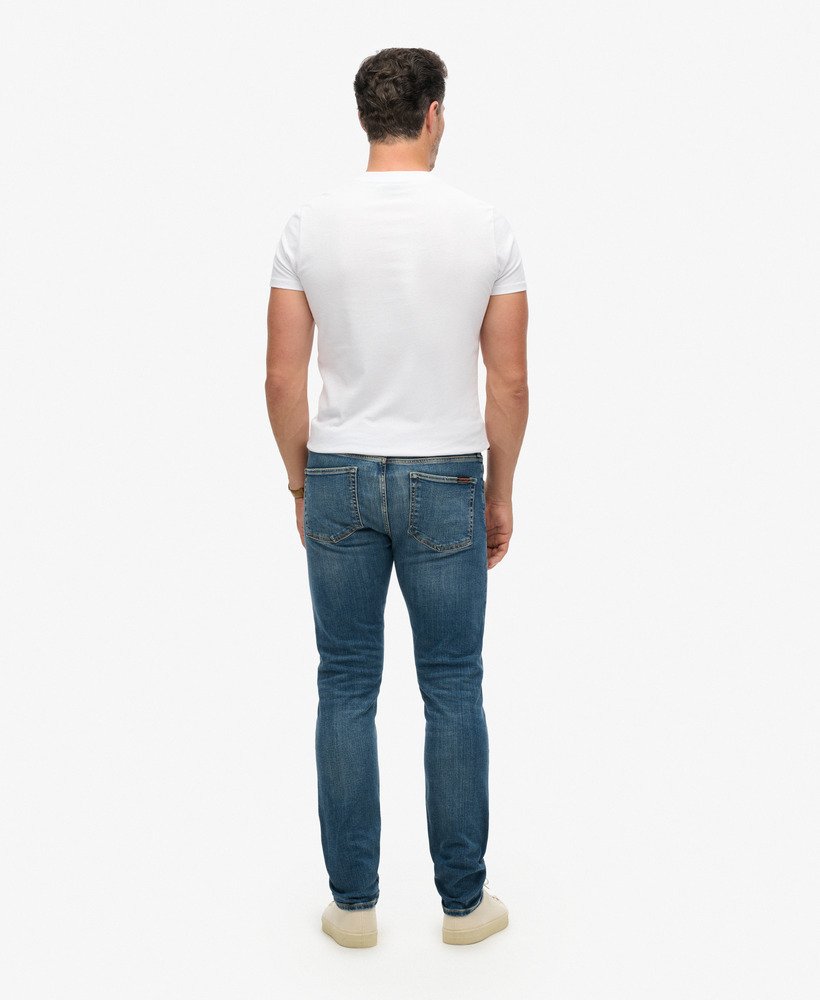 vintage slim fit jeans in mercer mid blue