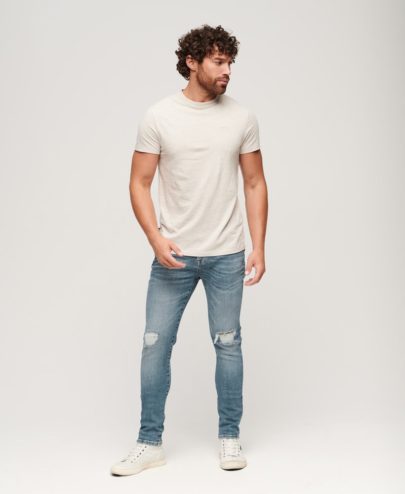 vintage skinny jeans in columbia blue met scheuren