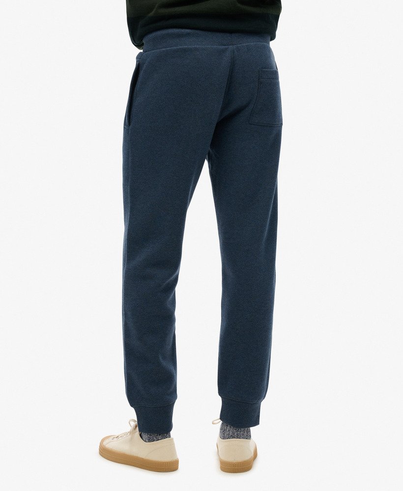 joggingbroek van biologisch katoen met vintage logo en borduursel in vintage marineblauw gemêleerd.
