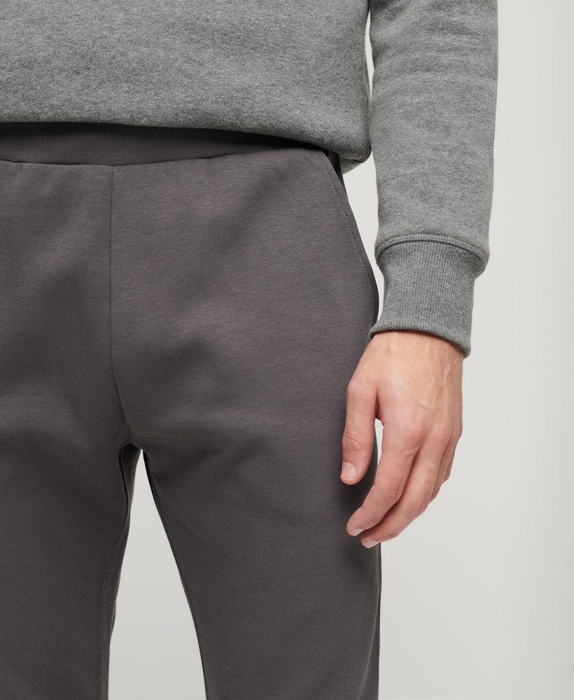 sport tech tapered joggers in donker leigrijs