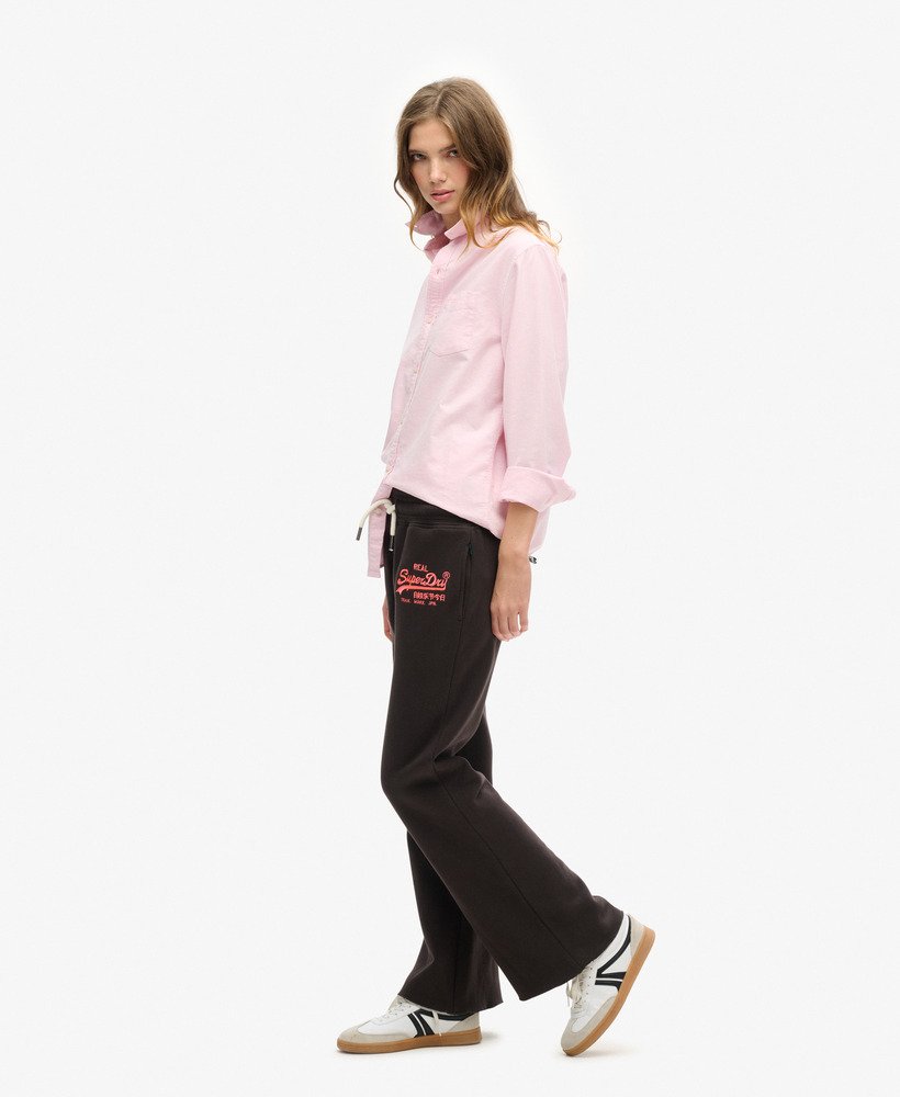 neon vintage logo low rise flare joggers in bison black